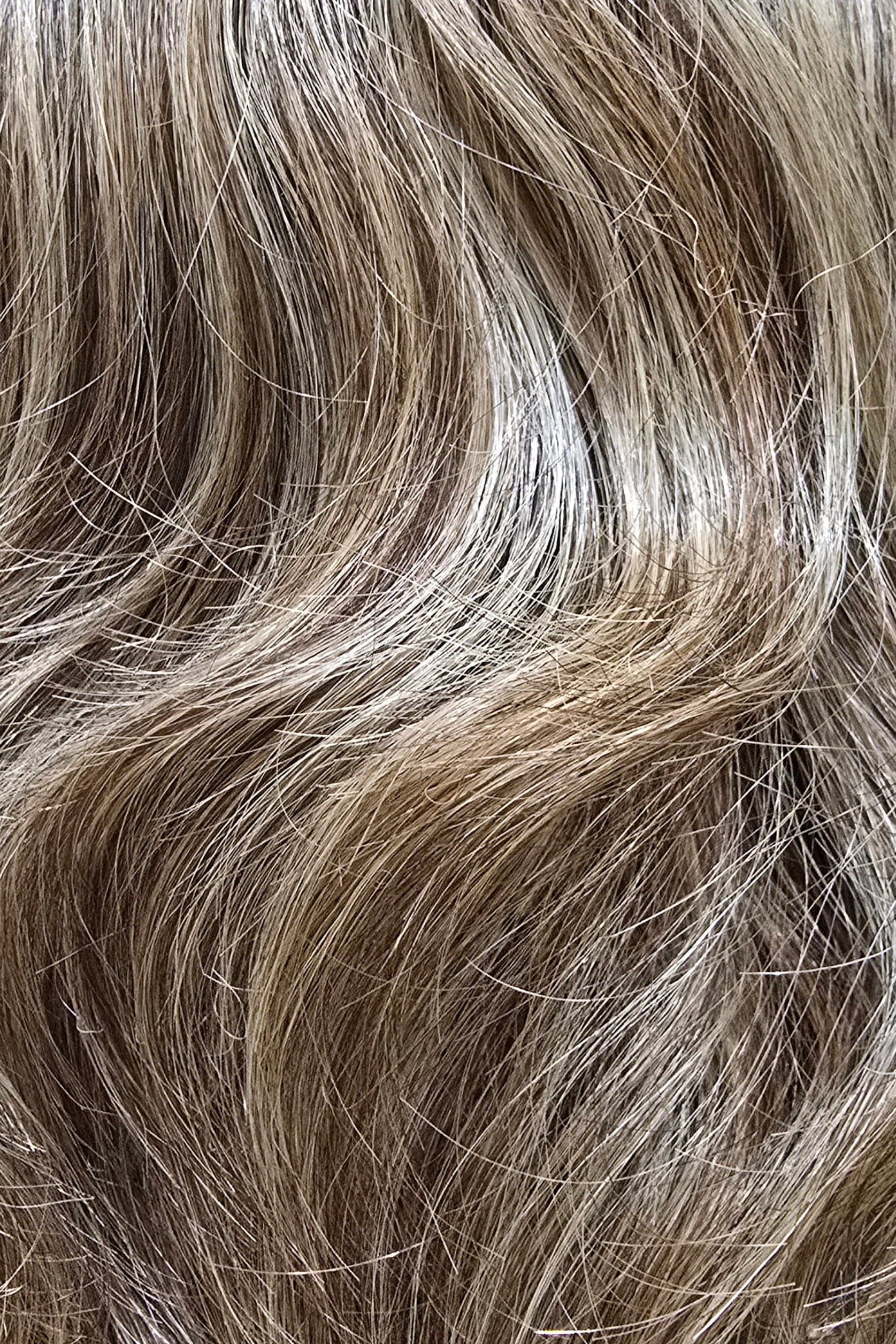 Sunlit Almond Rooted | A radiant blend of light golden brown and soft honey blonde tones, artfully enhanced by a slightly darker, natural root for dimension