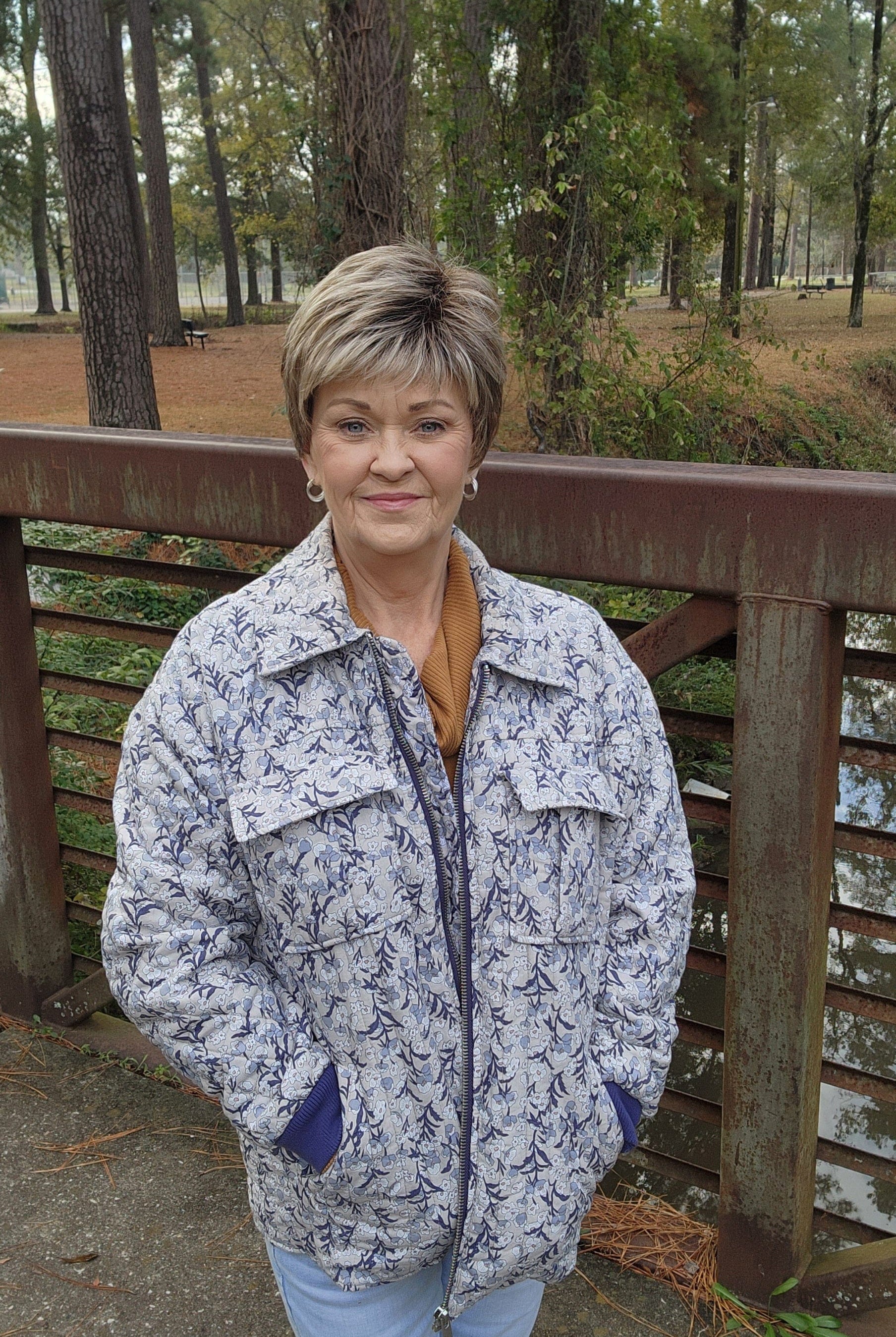 Woman wearing short pixie with bangs (Raquel Welch's Winner Premium in SS12/22)