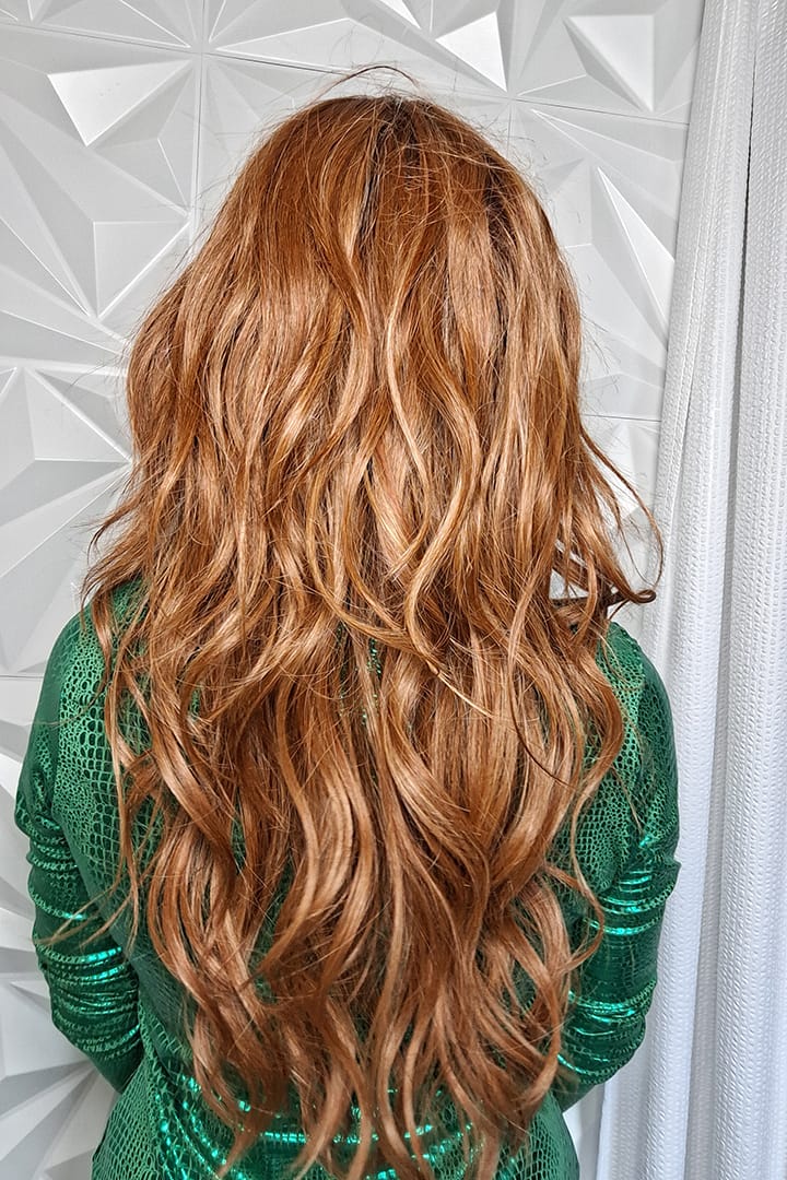Woman with long wavy red wig (Gaia by Auburn Spice R) back
