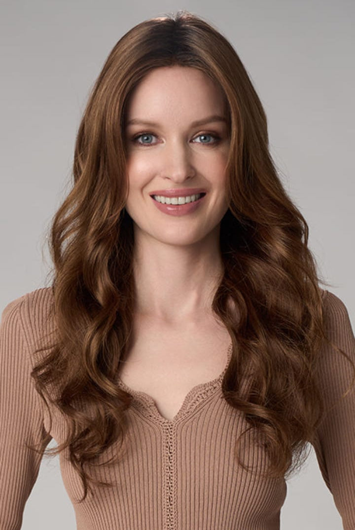 Woman wearing Brianna Hand Tied Wig by Envy in Cinnamon Toffee | Front smiling