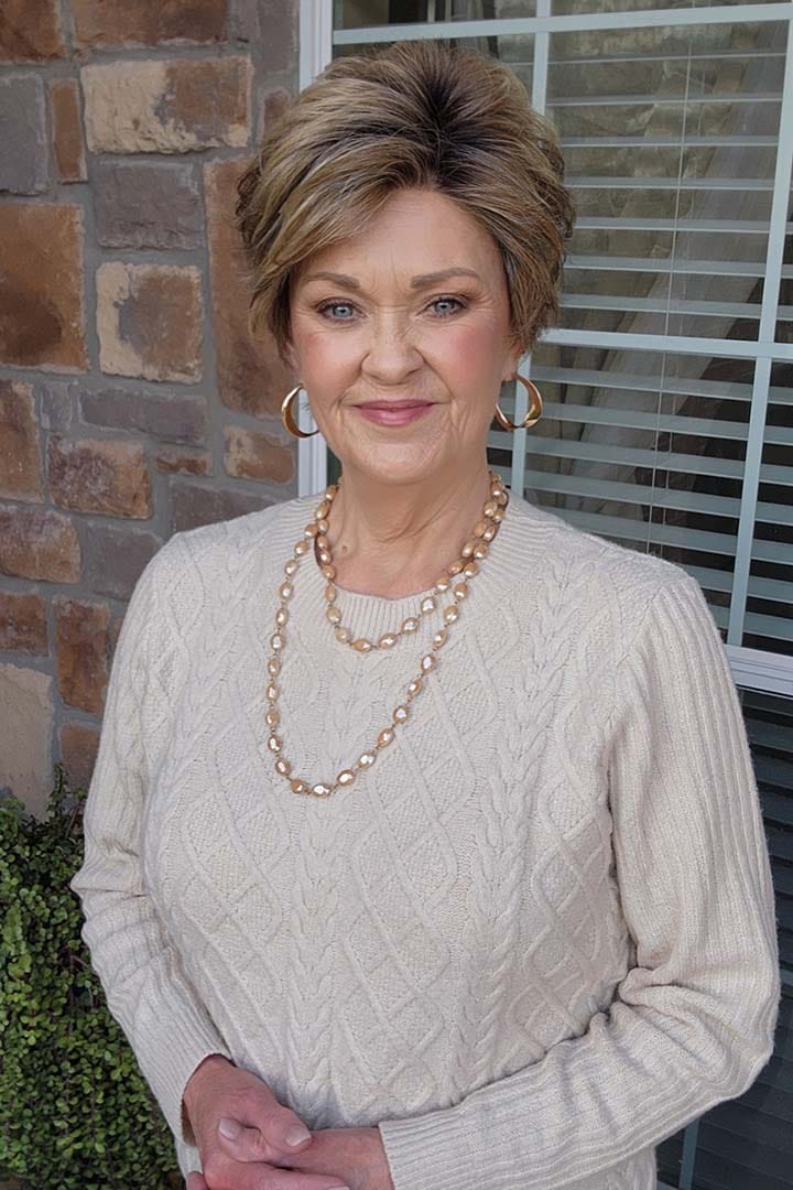 Woman wearing layered pixie wig (On Set by Gabor in GF11/25SS) Front