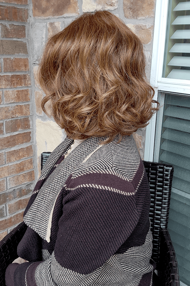 Woman wearing curly red bob wig (Gabor's In Bloom in Medium Red)
