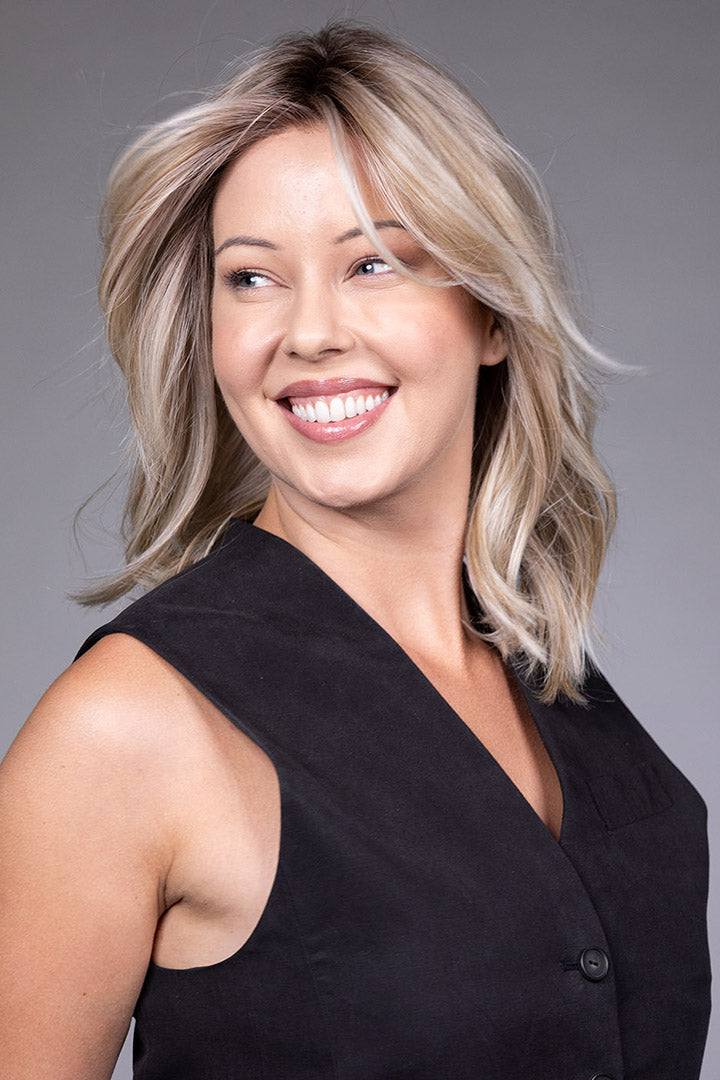 Woman wearing Monaco wig by Belle Tress in Milkshake Blonde R | Side smiling