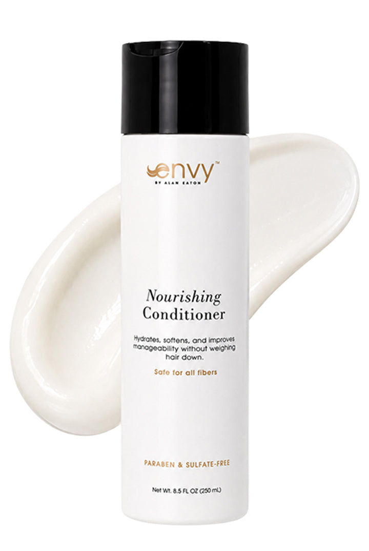 White 8.5 oz bottle of Envy Nourishing Conditioner with a black cap and a creamy white product swatch behind it.