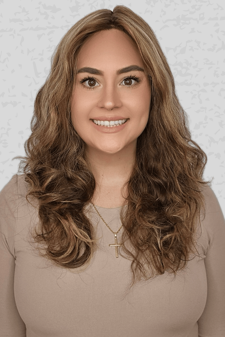 Woman with long, wavy hair wearing a 16-24 inch Bespoke wig from PUSH Hair in color Belle