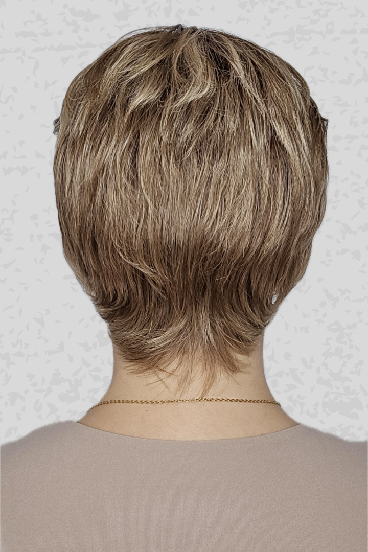 Woman with short blonde hair wearing PUSH Hair's Camille in color Shadow Champagne against a light background, back of head