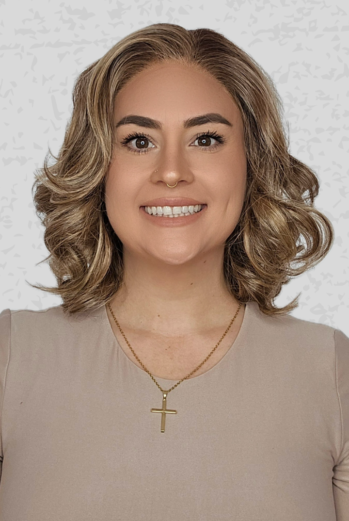 Woman wearing Lily by PUSH Hair in color Sunlit Almond R against a neutral background