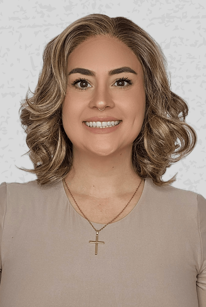 Woman wearing Lily by PUSH Hair in color Sunlit Almond R against a neutral background