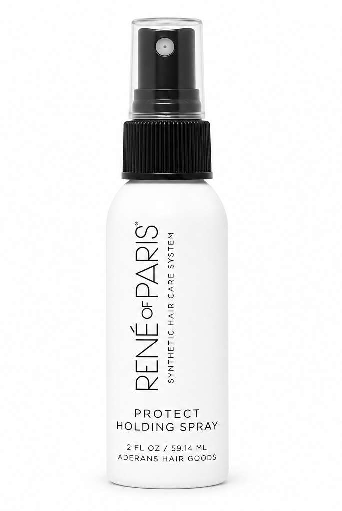 A white bottle of Rene or Paris Protect Holding Spray with a black spray nozzle, shown on a solid white background.
