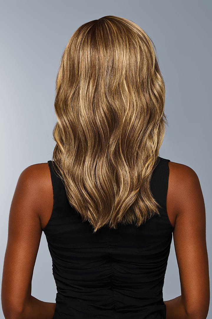 Woman is wearing Decadent Diva wig by Raquel Welch in color RL9/24SS | Back