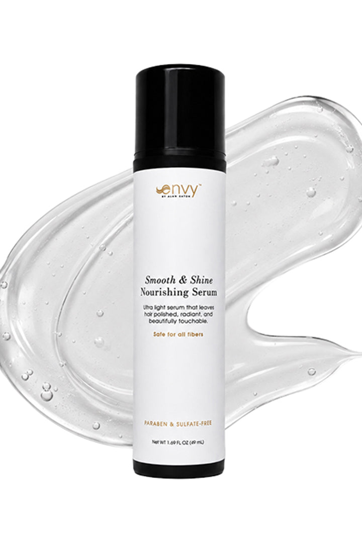 Envy Smooth & Shine Nourishing Serum bottle with a black cap against a clear, gel-like serum swirl background.