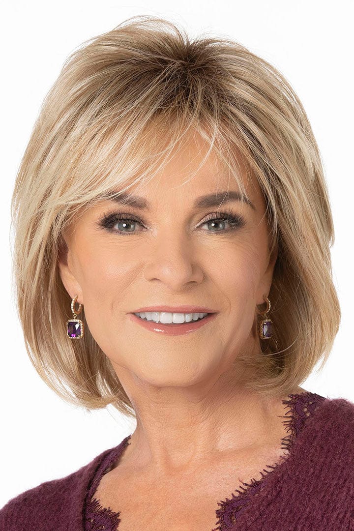 Smiling woman with blonde bob