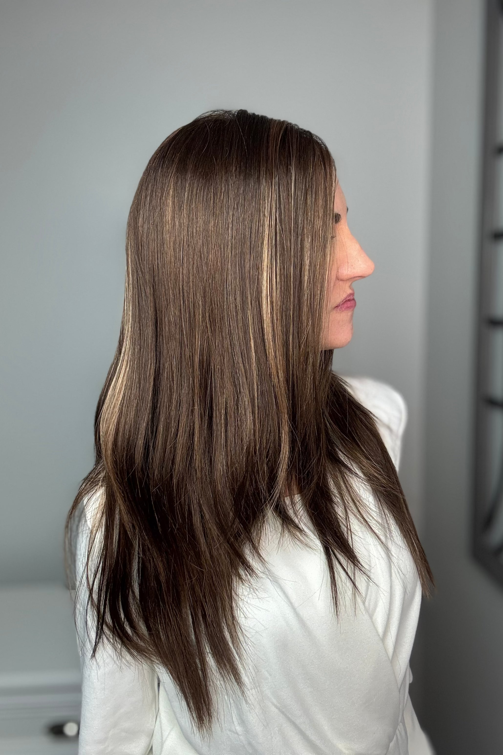 Woman with long brown wig (Violet by Henry Margu in 8/14H) side