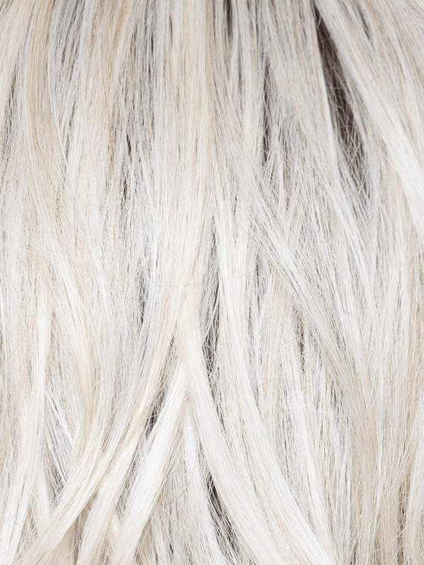 White Rose Blond-R | White blond base with subtle warm brown highlights. The medium-brown root creates a vibrant appearance.