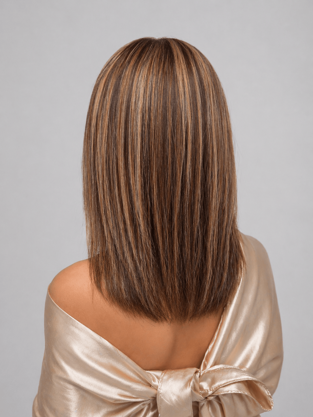 Belle | A base of rich brown, complemented by highlights in both light brown and medium ash blonde, creating a multi-dimensional and natural-looking effect, adding depth and warmth to the overall color.