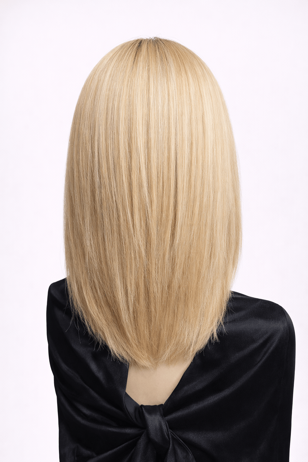 Doré | A luxurious blend of medium natural-ash blonde and light natural blonde with a medium ash brown root, creating a multi-dimensional hair color with a mix of lighter brown and blonde tones.