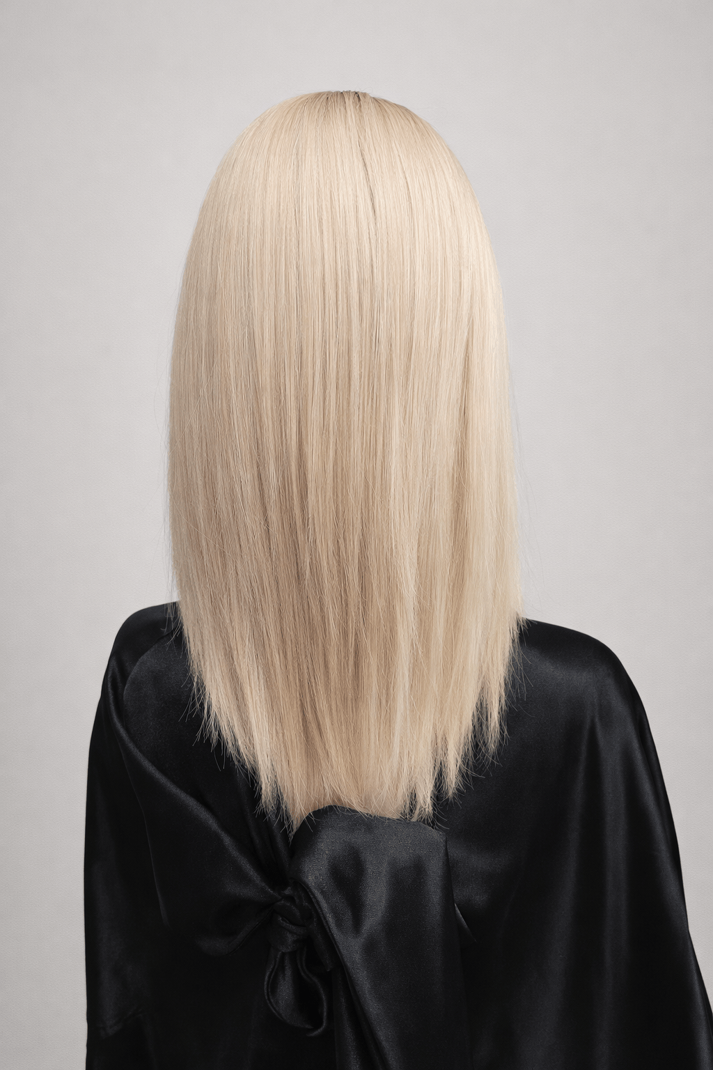 Glacial | A cool-toned light ash blonde color with light brown rooting, boasting sophistication and confidence.