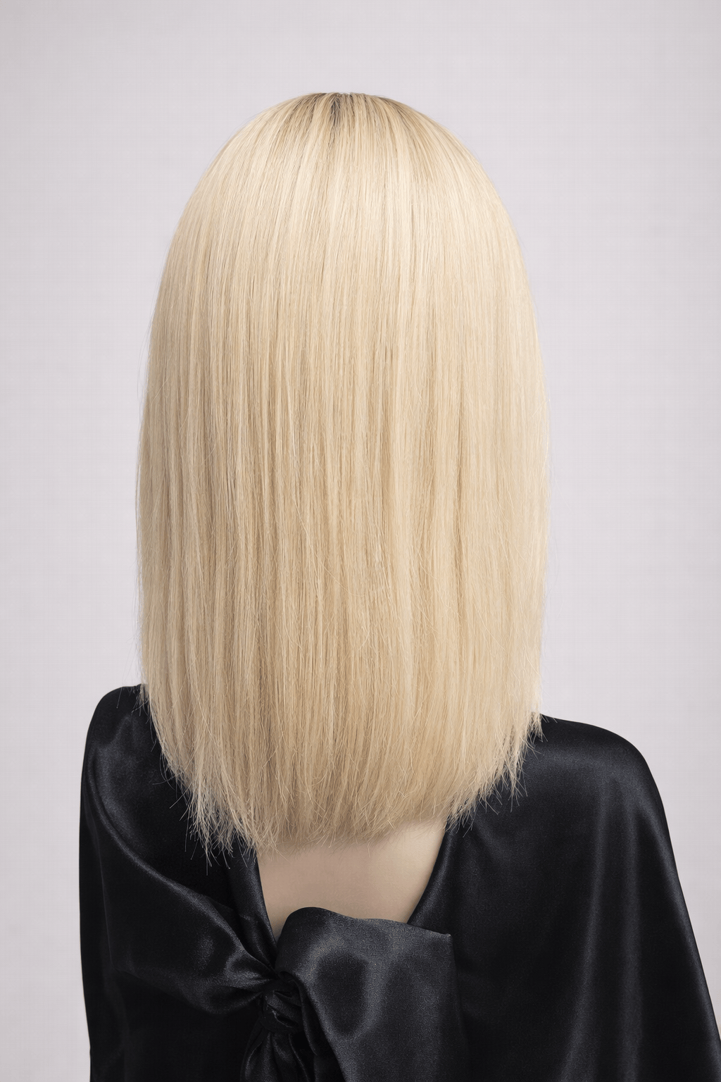 Glacial | A cool-toned light ash blonde color with light brown rooting, boasting sophistication and confidence.
