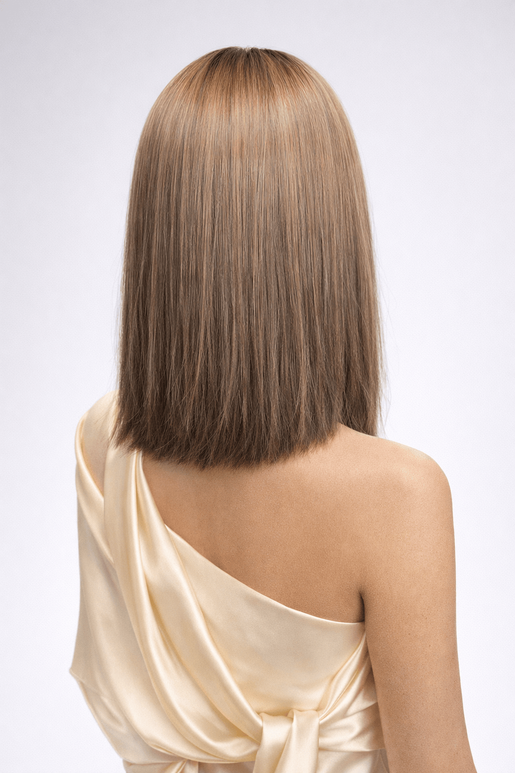 Noisette | A rich brown base with auburn highlights to add warmth and dark blonde highlights to add subtle brightness and dimension for a sun-kissed look.