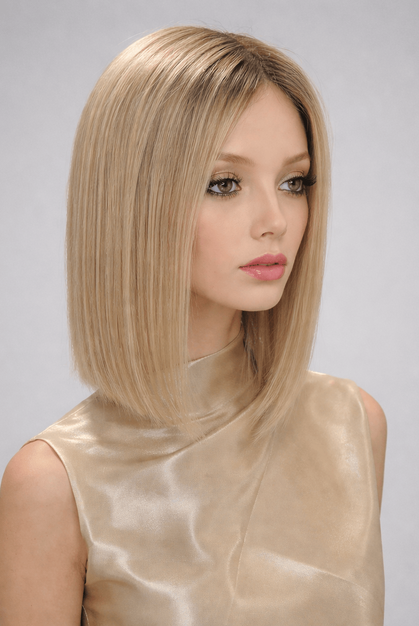 Woman wearing Genevieve human hair wig by push in color Fleur Blonde - Front view.