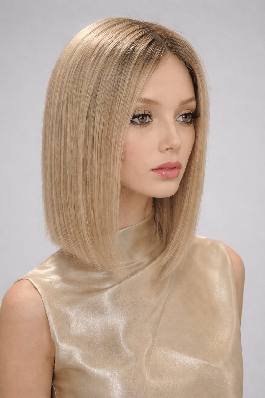 Woman wearing Genevieve human hair wig by push in color Fleur Blonde - Front view.