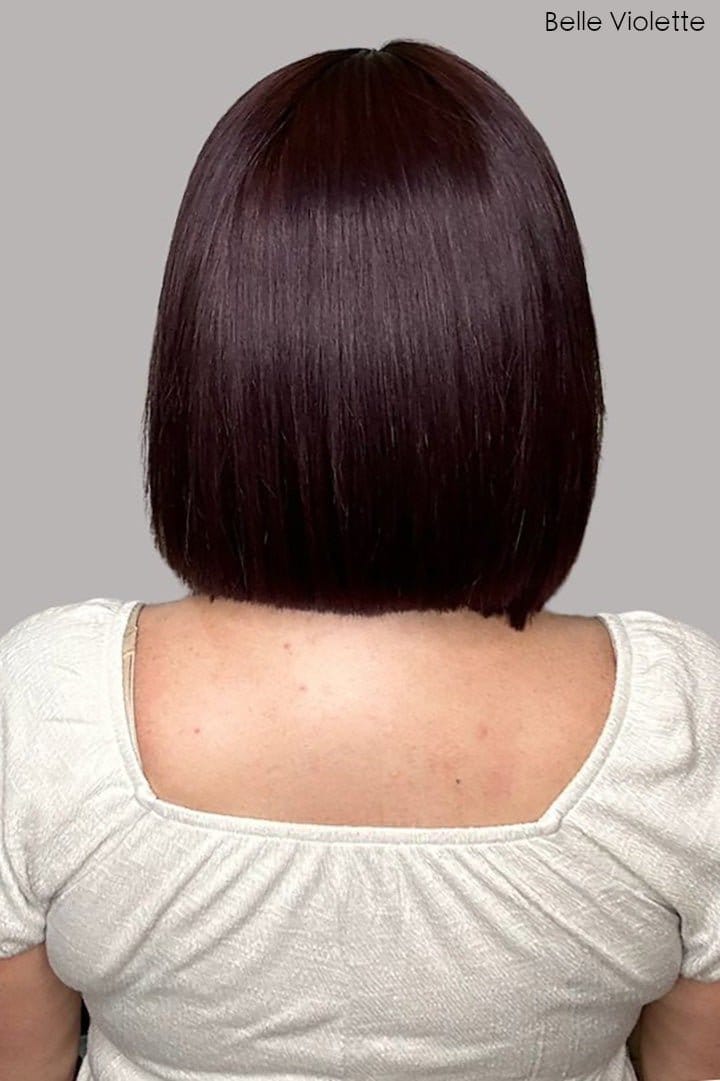 Christi is wearing Genevieve Human Hair Wig in color Belle Violette - Back view