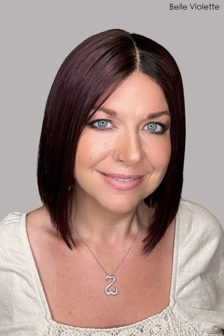 Christi is wearing Genevieve Human Hair Wig in color Belle Violette - Front view