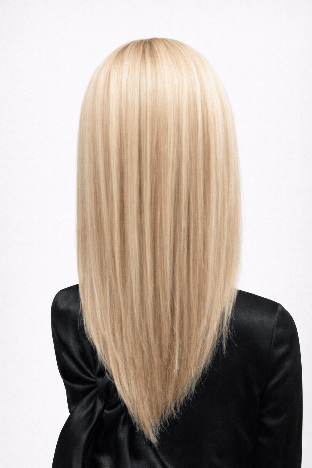Doré | Doré is a luxurious blend of medium natural-ash blonde and light natural blonde with a medium ash brown root, creating a multi-dimensional hair color with a mix of lighter brown and blonde tones.