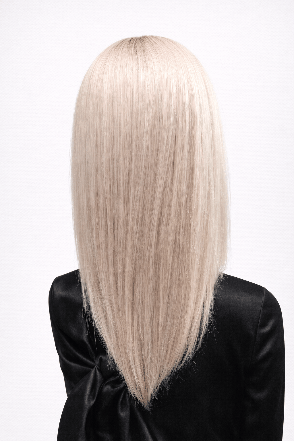 Glacial | Glacial is a cool-toned light ash blonde color with light brown rooting, boasting sophistication and confidence.