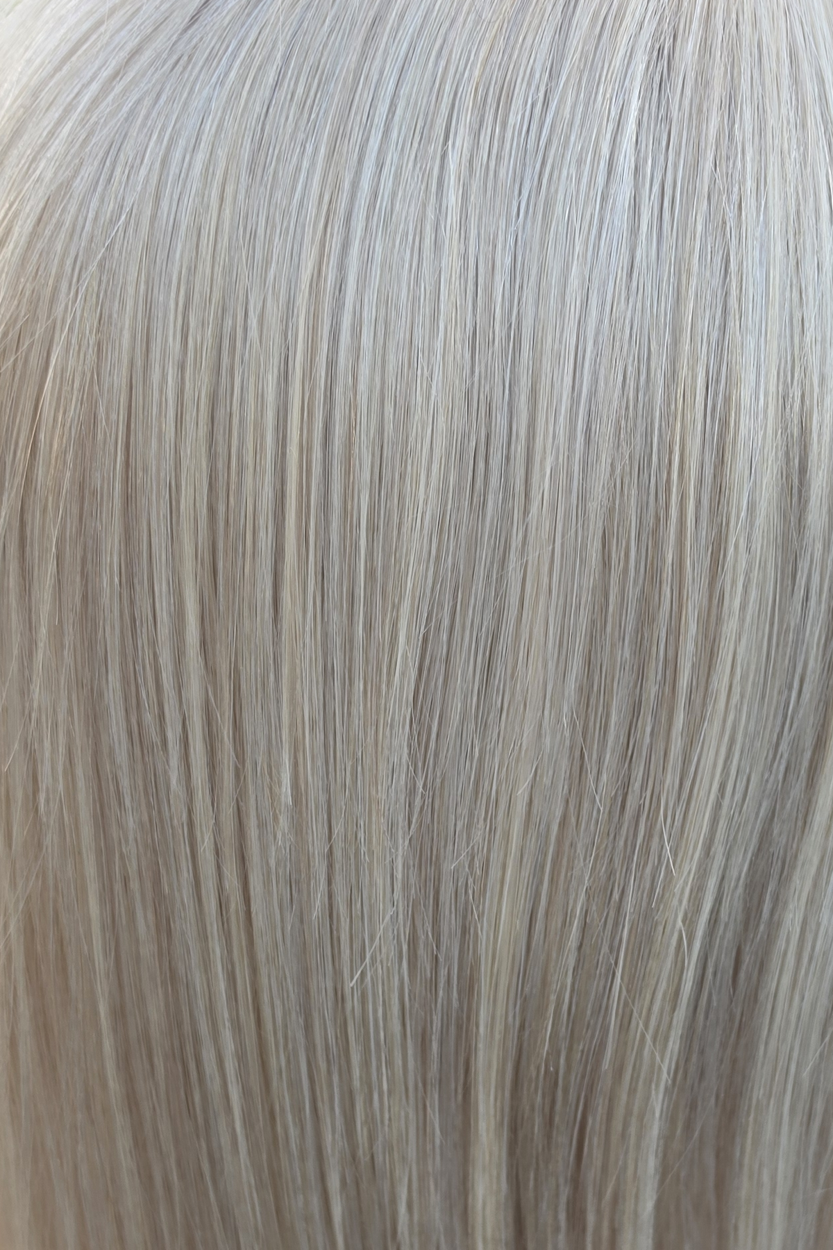 Honey Beige Blonde | A soft, dimensional blonde that blends warm honey-golden tones with creamy beige blonde highlights.