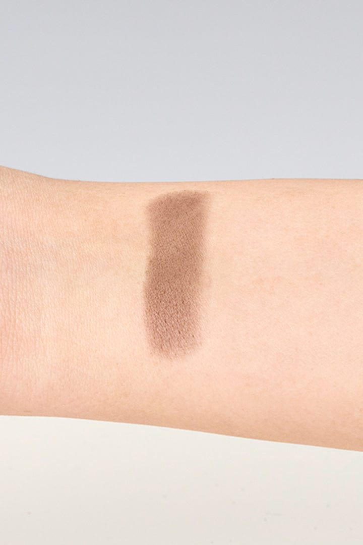 Swatch of Love Match Powder Stick by Envy Color 8 on wrist