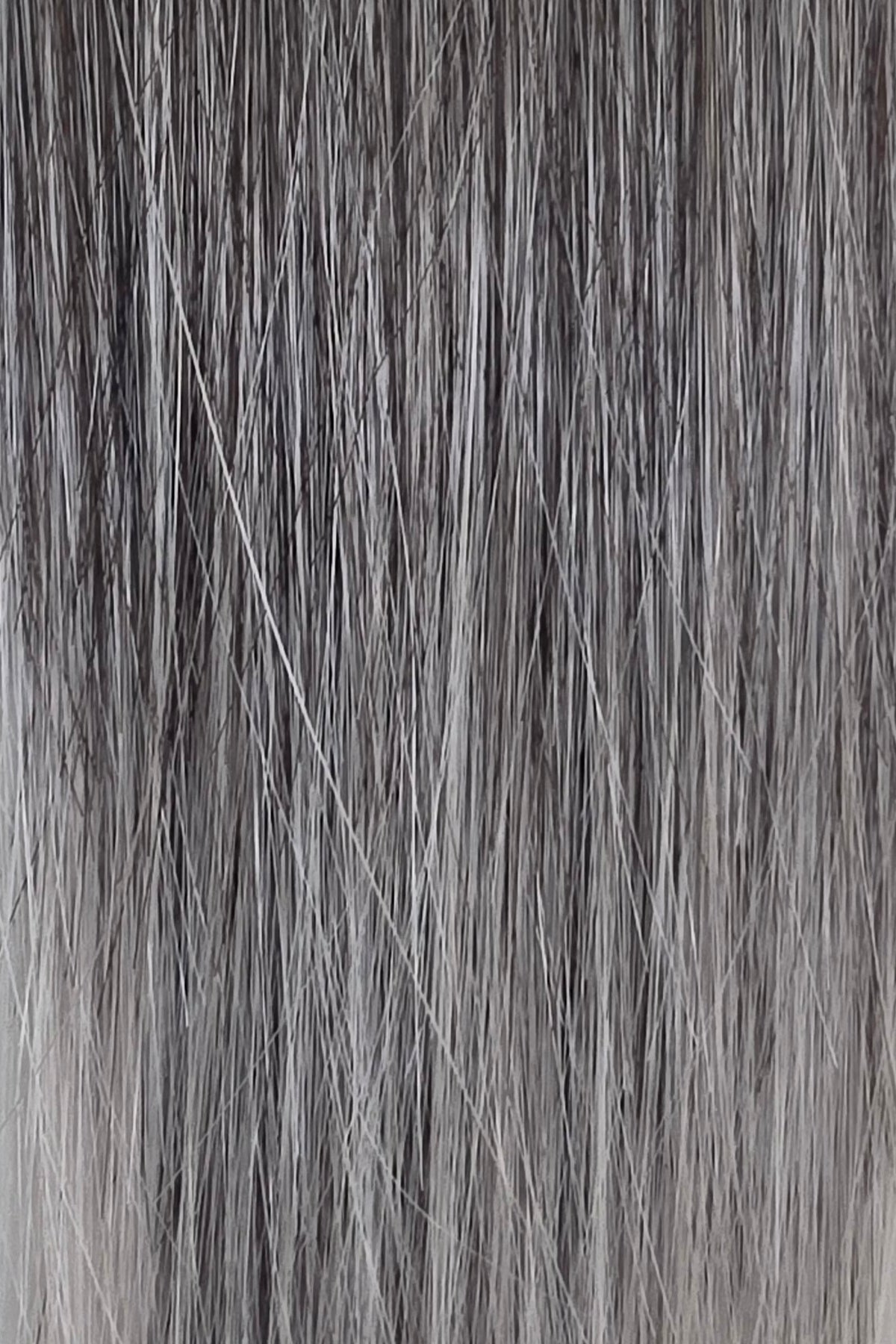 Midnight Ombré | A dramatic, dimensional grey ombré that begins with a deep charcoal grey at the root, gradually melting into cool smoky grey through the mid-lengths, and finishing with soft pearl-grey ends.