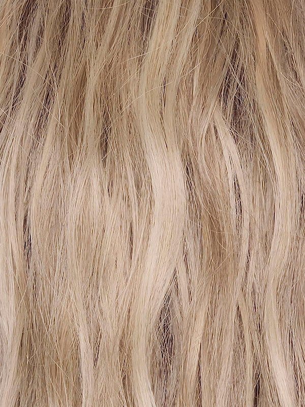 Buttercream Blond-R | The rooted sister of Buttercream Blond, this baby blonde features a warm chocolate root and a radiant blend of ash, honey, and pale gold tones for a soft, sophisticated finish.