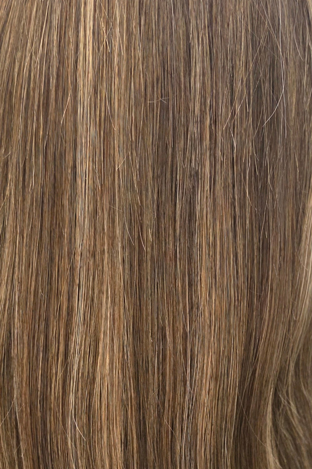 Toasted Almond | 10/14 | A beautifully dimensional blend of neutral light brown and dark blonde tones accented with soft honey-blonde highlights.