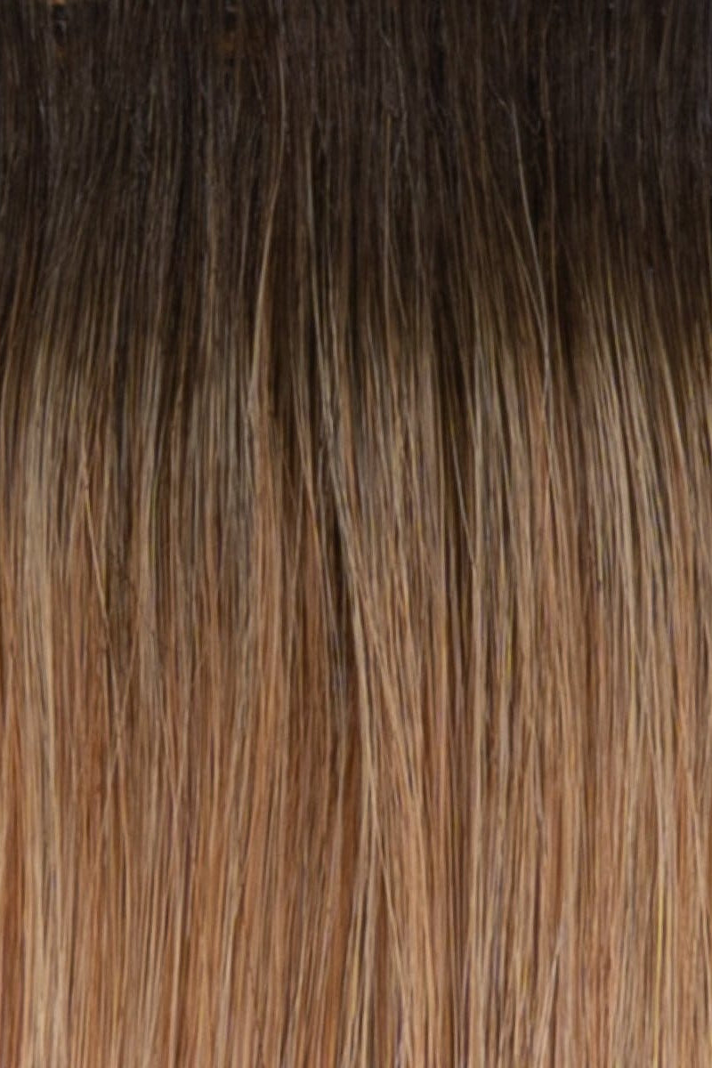 RH25/27SS | Shaded Butterscotch | A rooted medium brown / brunette shade built around butterscotch. The darker root gives the color extra depth while the lengths show the lighter blended tones.