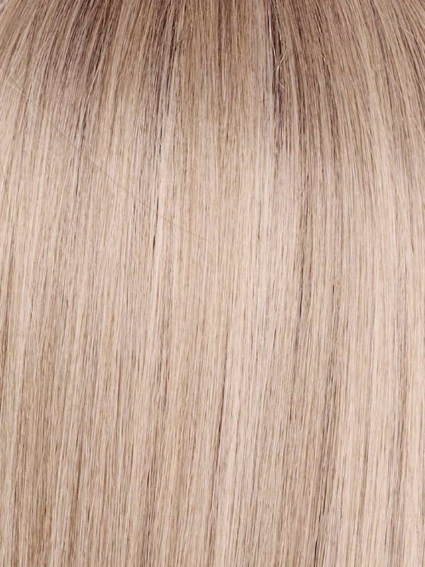 Billionaire Blond | A rich mocha root melts into soft tones of beige, ash, and cream blonde. Bright cream and white-blonde highlights frame the face, adding dimension and a refined, high-end finish.