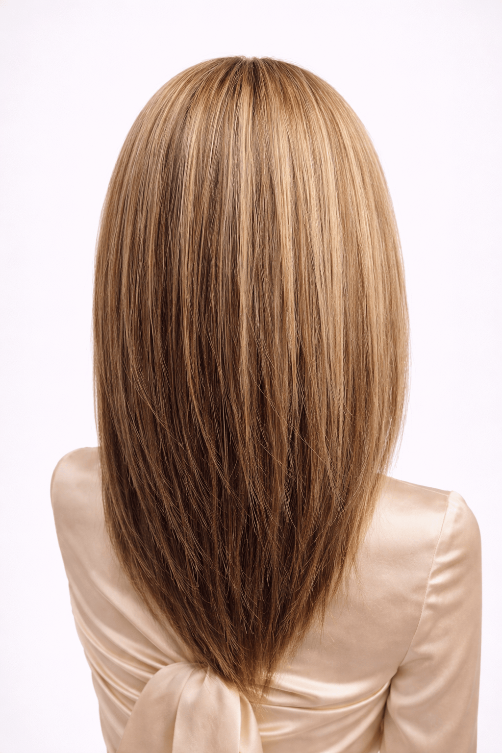 Belle | A base of rich brown, complemented by highlights in both light brown and medium ash blonde, creating a multi-dimensional and natural-looking effect, adding depth and warmth to the overall color.