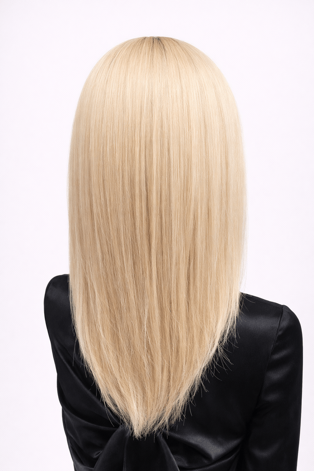 Glacial | A cool-toned light ash blonde color with light brown rooting, boasting sophistication and confidence.