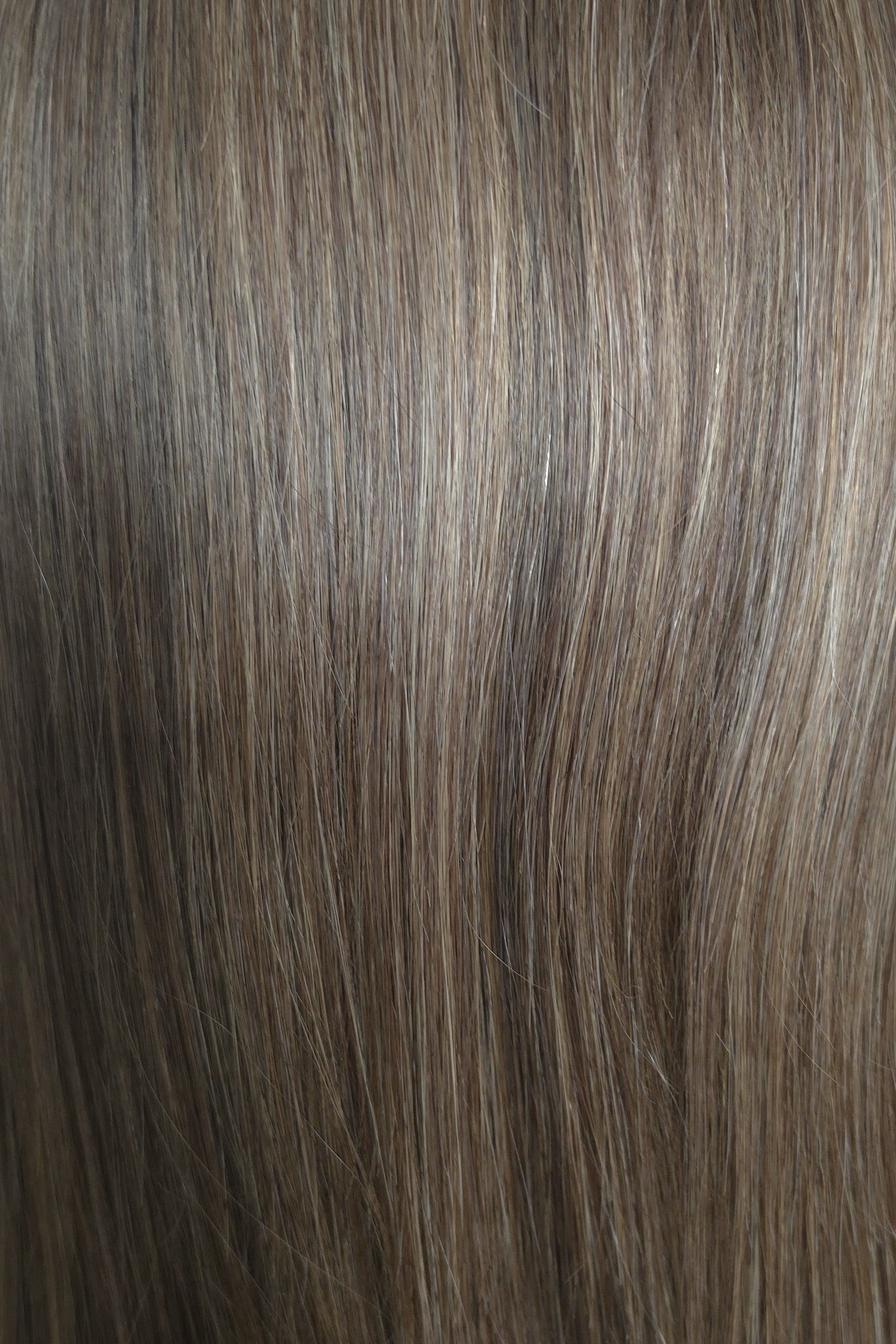 Toasted Almond | A beautifully dimensional blend of neutral light brown and dark blonde tones accented with soft honey-blonde highlights.