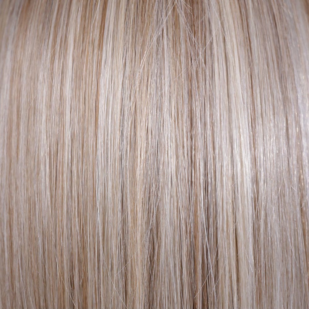 Butterbeer-R | 10/60/88+8 | Butterbeer Root is a cozy blend with soft brown roots transitioning to buttery blonde infused with honey and toffee tones. This radiant, multidimensional shade flatters various skin tones, adding brightness and warmth.