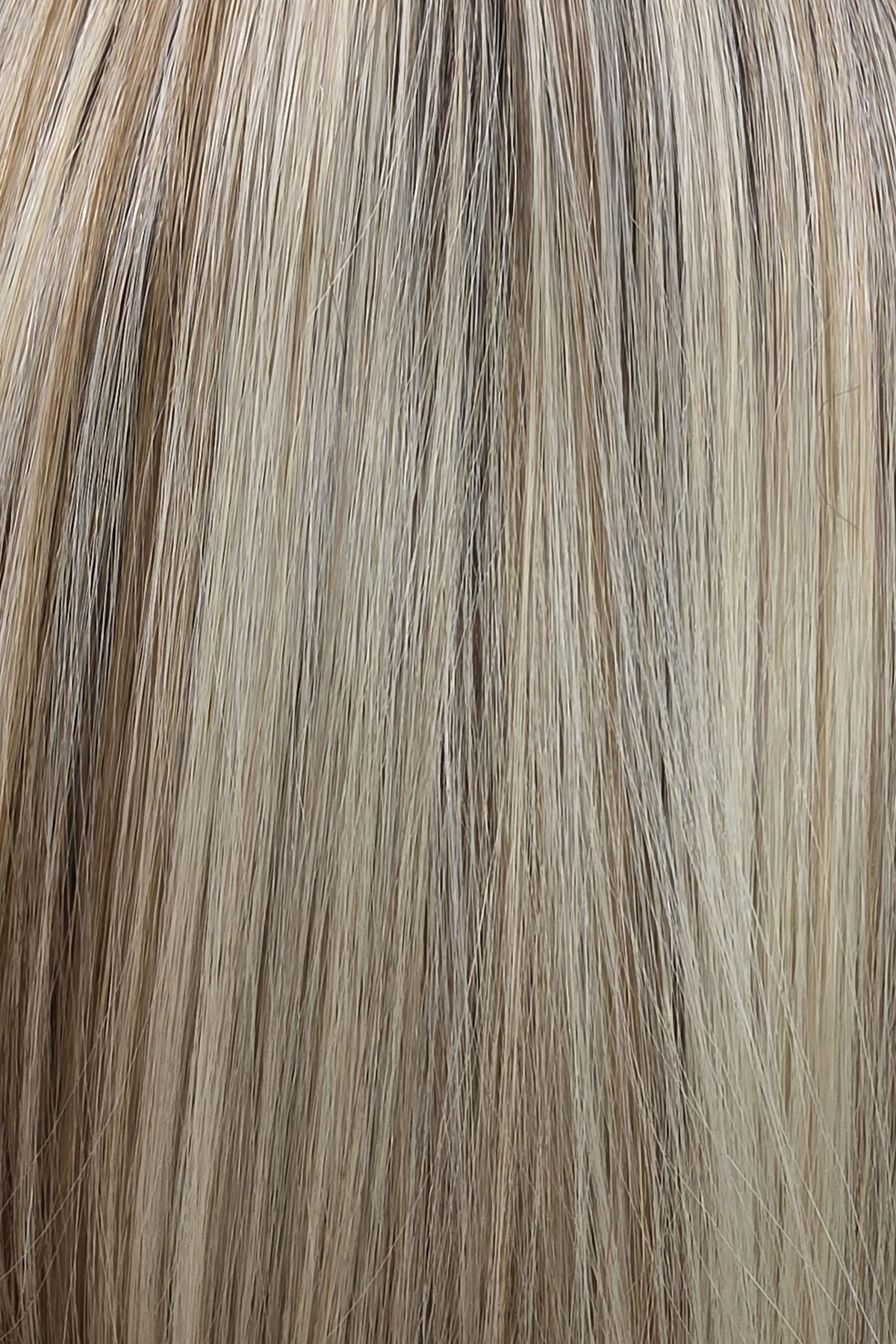 White Champagne Rooted | A soft, dimensional neutral blonde with fine ribbons of light beige blonde, white champagne blonde, and pale sandy blonde blended throughout, with a few slightly warmer honey-beige strands and a light brunette base.
