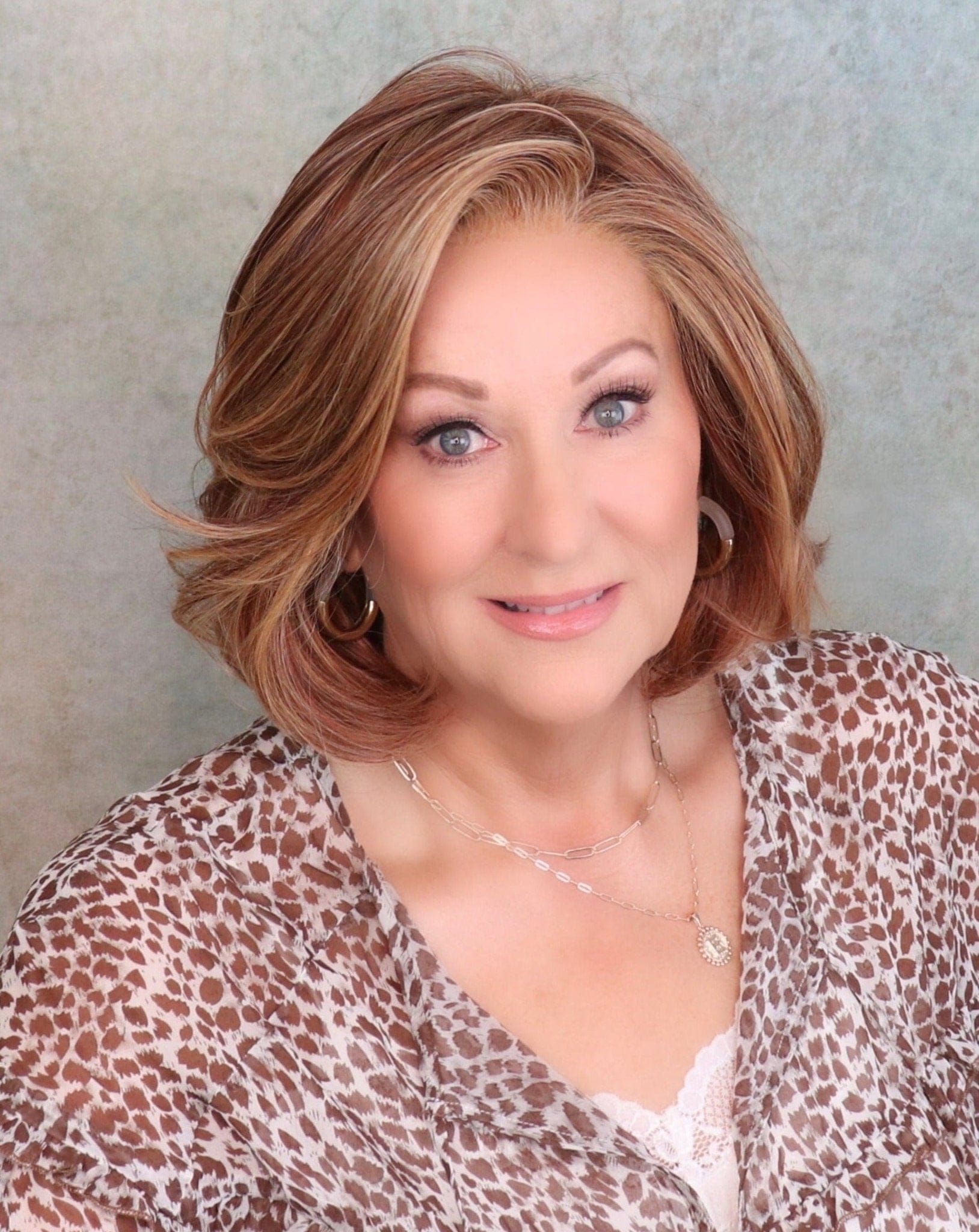 Untold Story by Raquel Welch| HF Synthetic Lace Front Wig | Hand Tied - Color