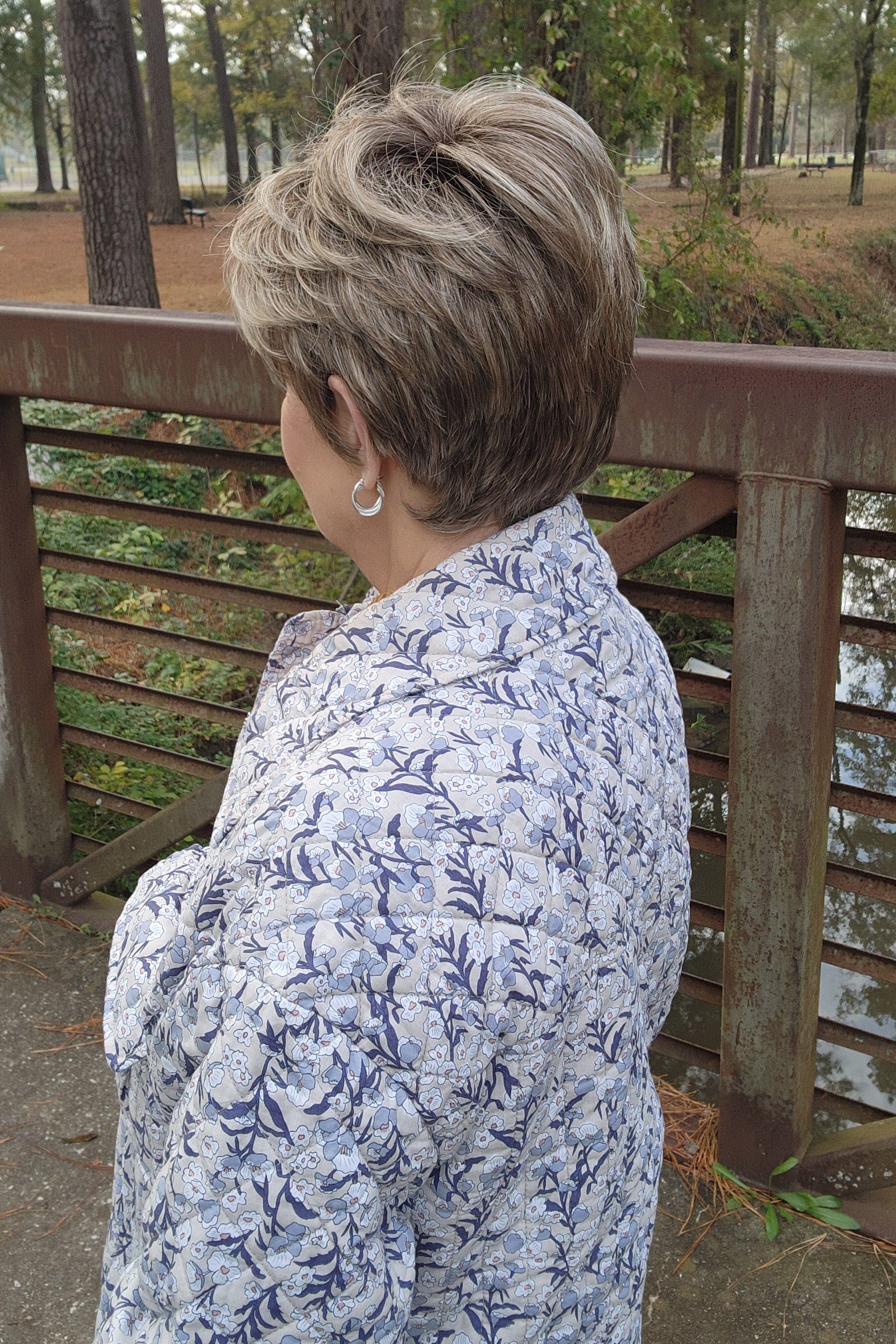 Woman wearing short pixie with bangs (Raquel Welch's Winner Premium in SS12/22)