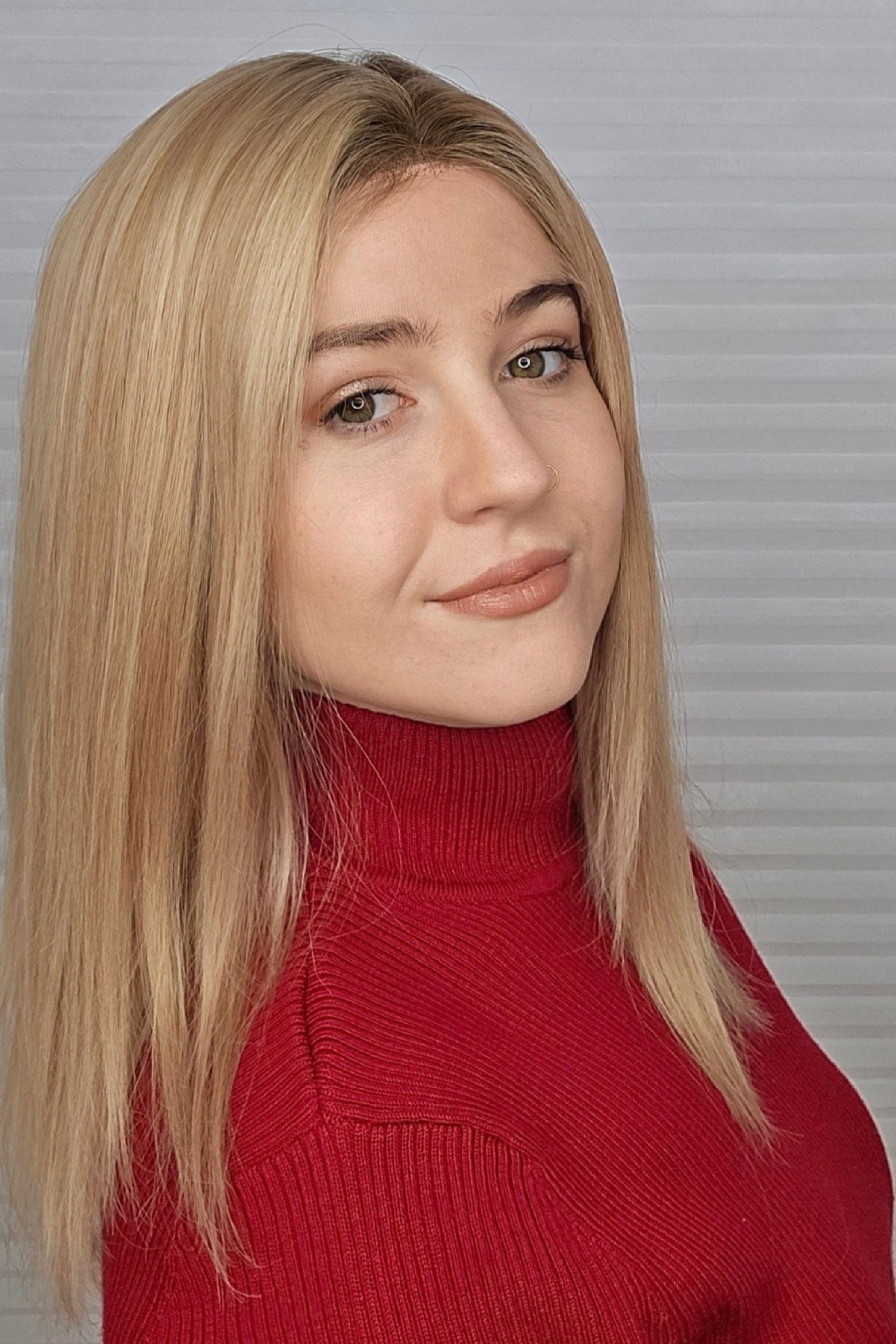 Megan wearing Sophia Human Hair Wig in color Brulee - Front View