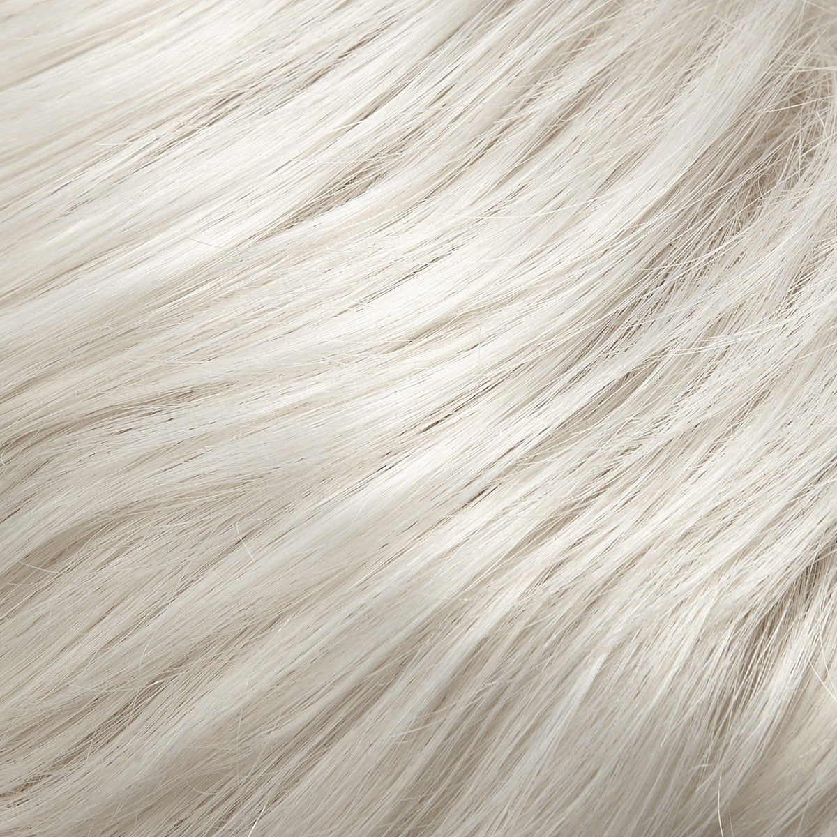 Close-up of white, wavy hair strands.