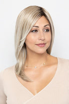 Woman is wearing Whisper wig by Henry Margu in 10/613GR | Side