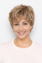 Woman wearing Misty wig by Henry Margu in 8/27/33H | Front bang styles down across forehead
