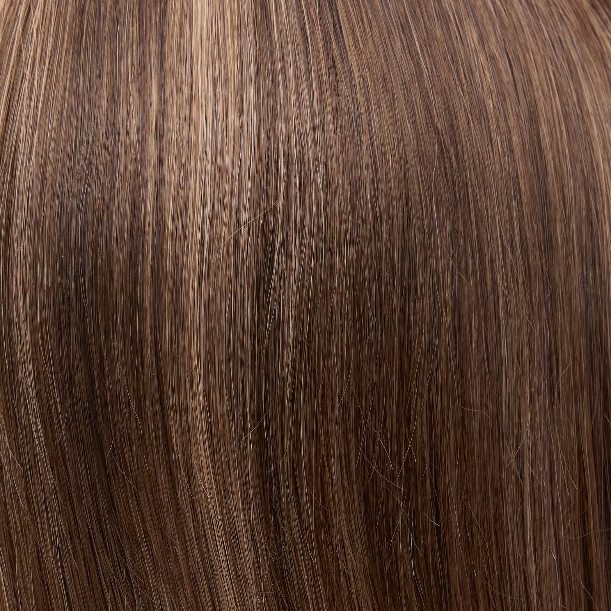 6B/22S6 | Toasted Almond | A blended medium brown with light brown highlights and a medium brown shaded root. The cool-toned base and delicate highlights add understated dimension for a natural, modern brunette look.
