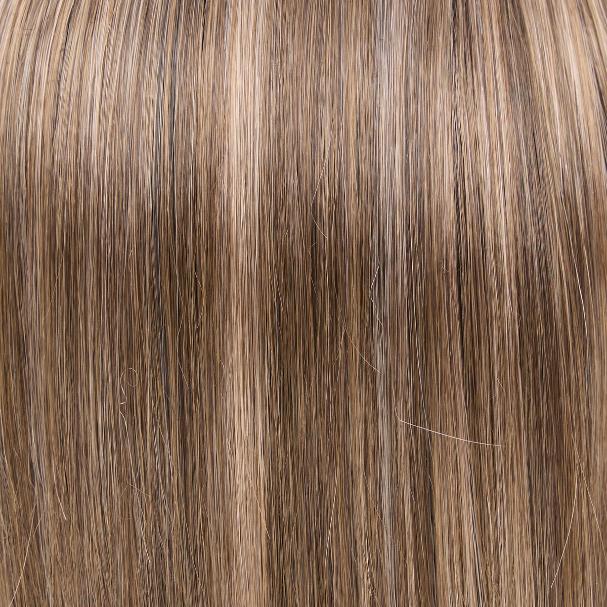 6B/22S6 | Toasted Almond | A blended medium brown with light brown highlights and a medium brown shaded root. The cool-toned base and delicate highlights add understated dimension for a natural, modern brunette look.