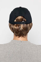 Woman wearing Tapered Black Hat by Henry Margu in 8/27/33H | Front